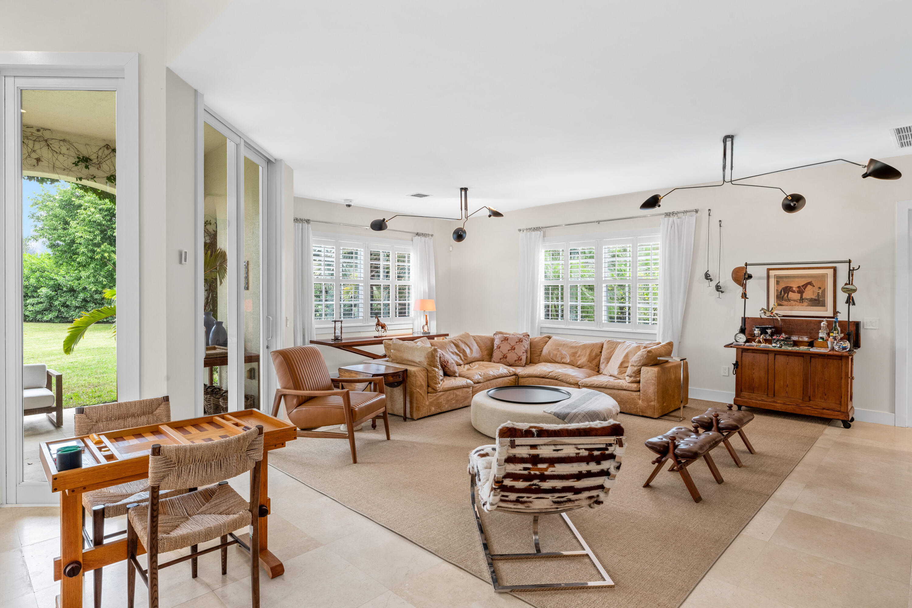 14739 Jumper Road Wellington, FL 33449 - Photo 33 of 124 a living room with furniture and a large window
