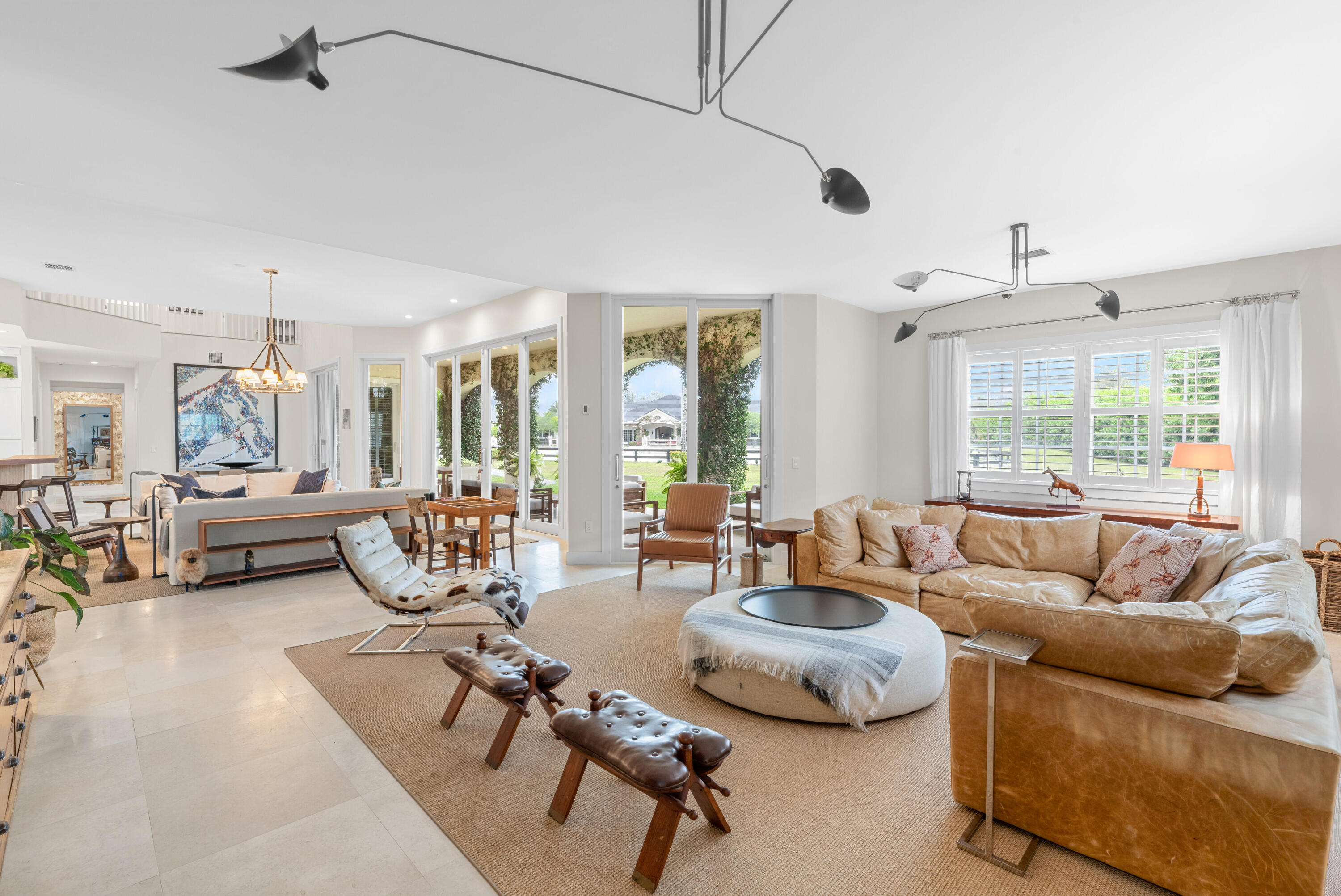 14739 Jumper Road Wellington, FL 33449 - Photo 34 of 124 a living room with furniture and a large window