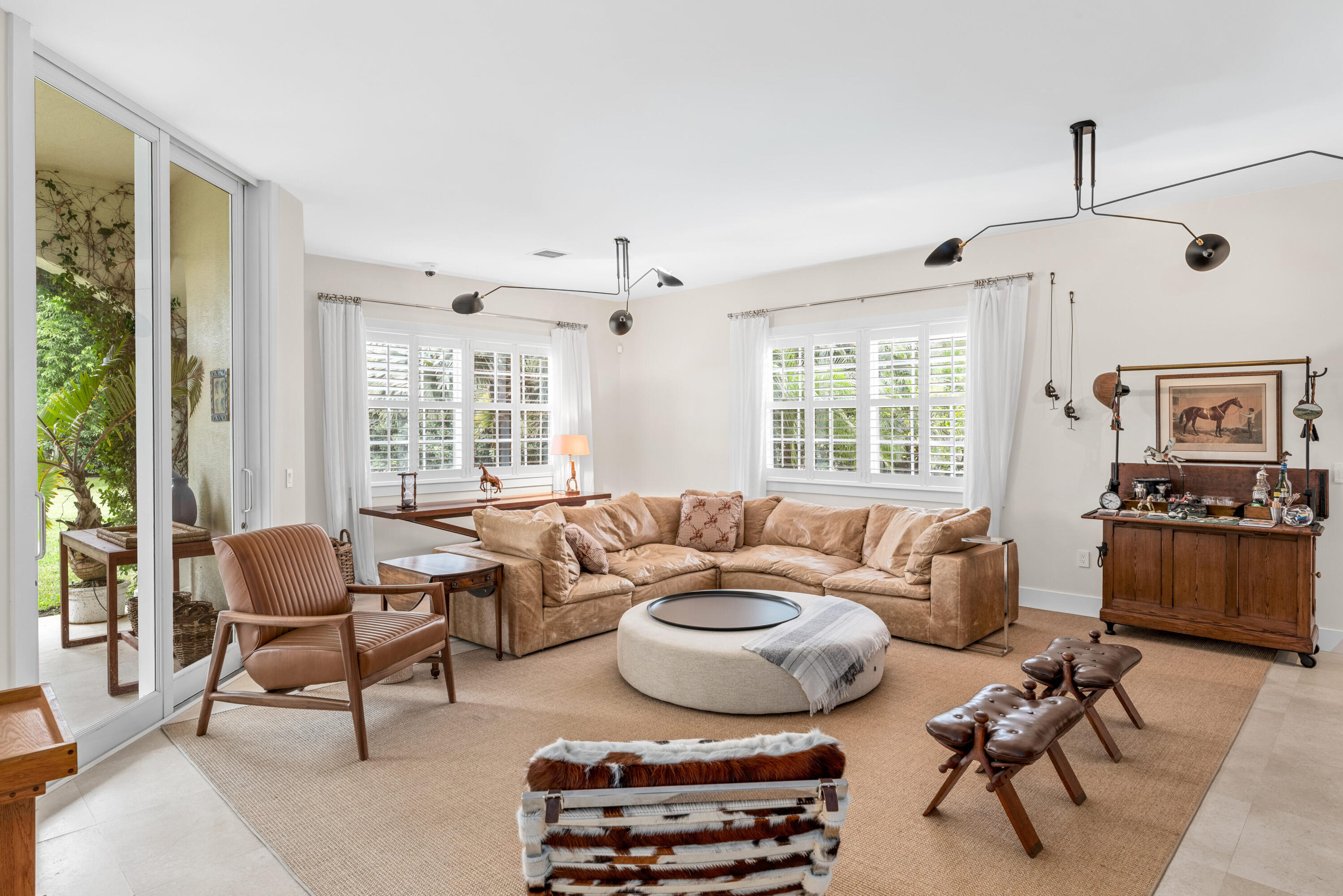 14739 Jumper Road Wellington, FL 33449 - Photo 35 of 124 a living room with furniture and a window