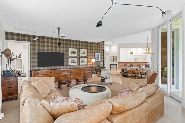 a bedroom with a bed and a lamp