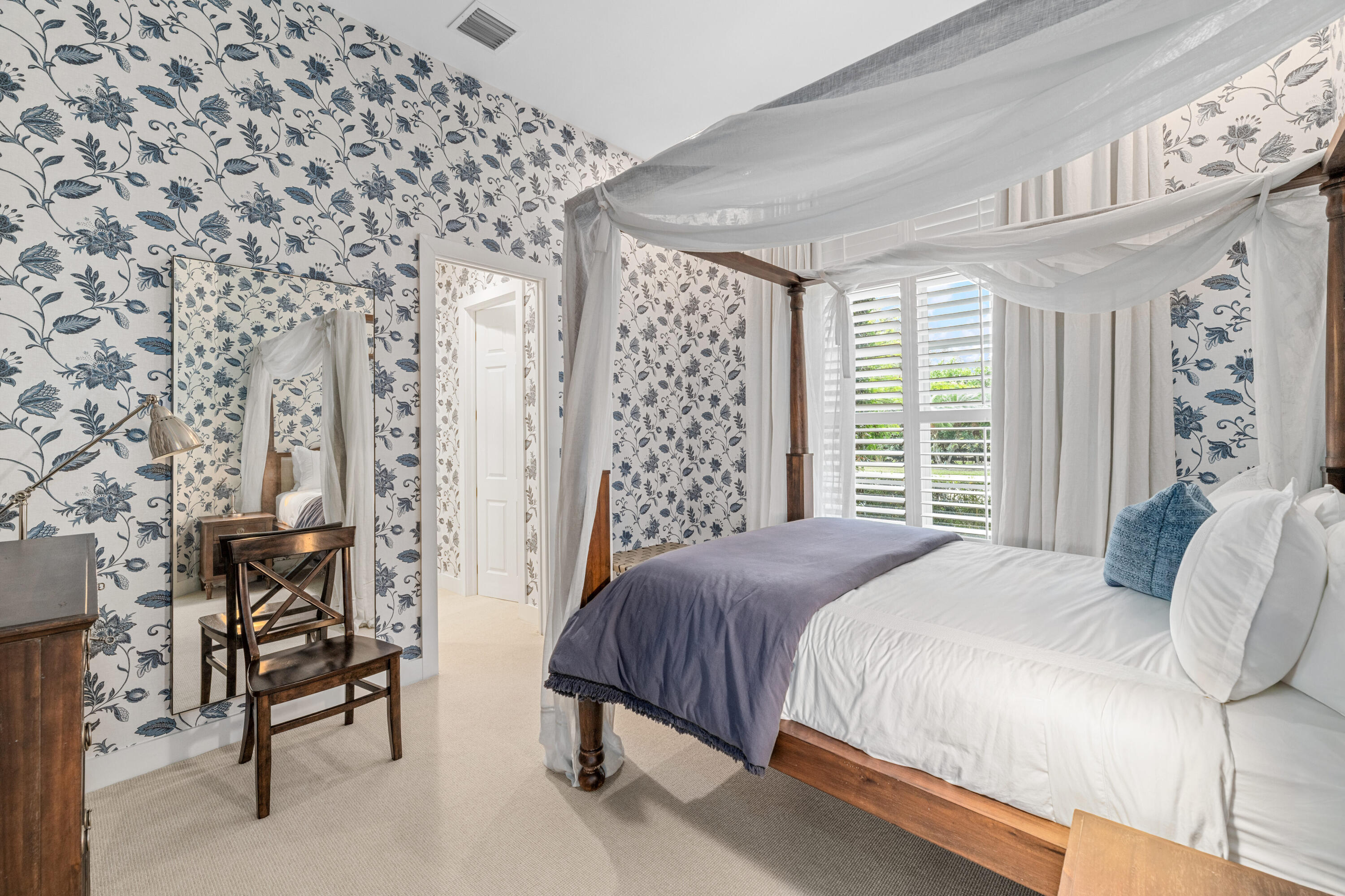 14739 Jumper Road Wellington, FL 33449 - Photo 56 of 124 a bedroom with a bed and a table