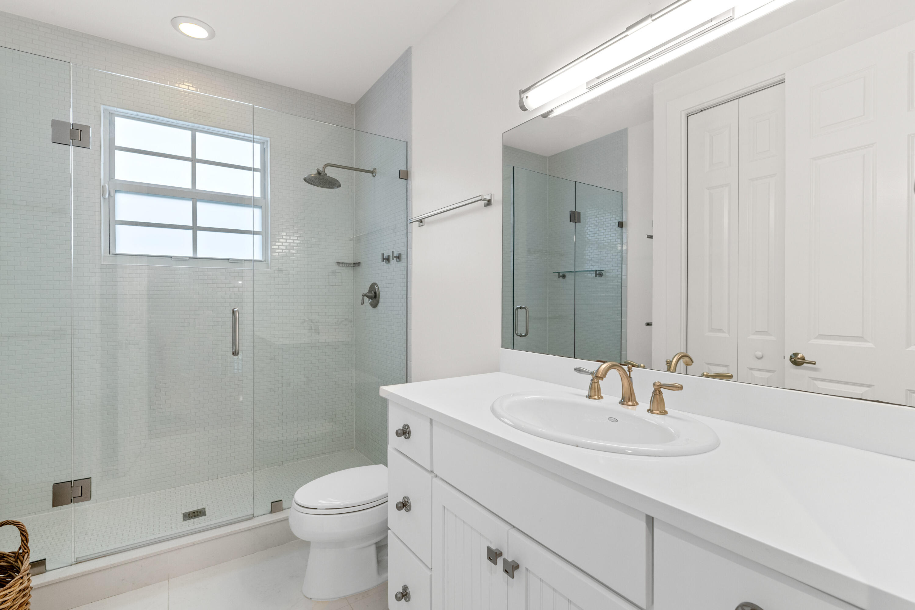 14739 Jumper Road Wellington, FL 33449 - Photo 64 of 124 a bathroom with a sink toilet and shower