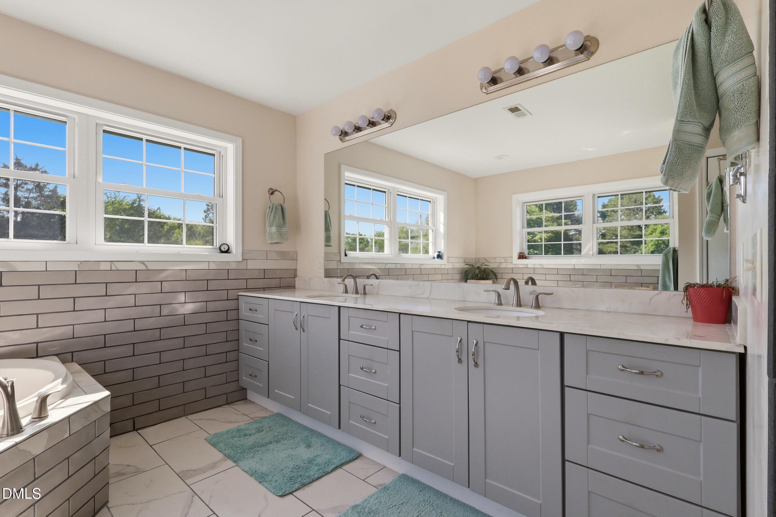 2631 South Jim Minor Road Haw River, NC 27258 - Photo 23 of 62 a kitchen with sink cabinets and window