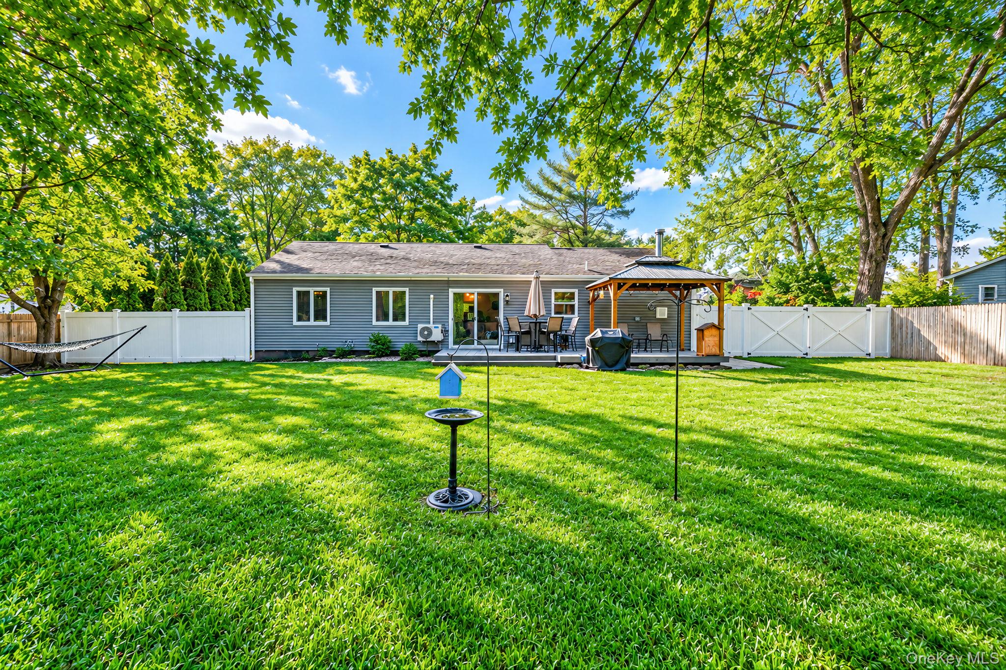 105 Raynor Road Ridge, NY 11961 - Photo 5 of 27 Rear View I