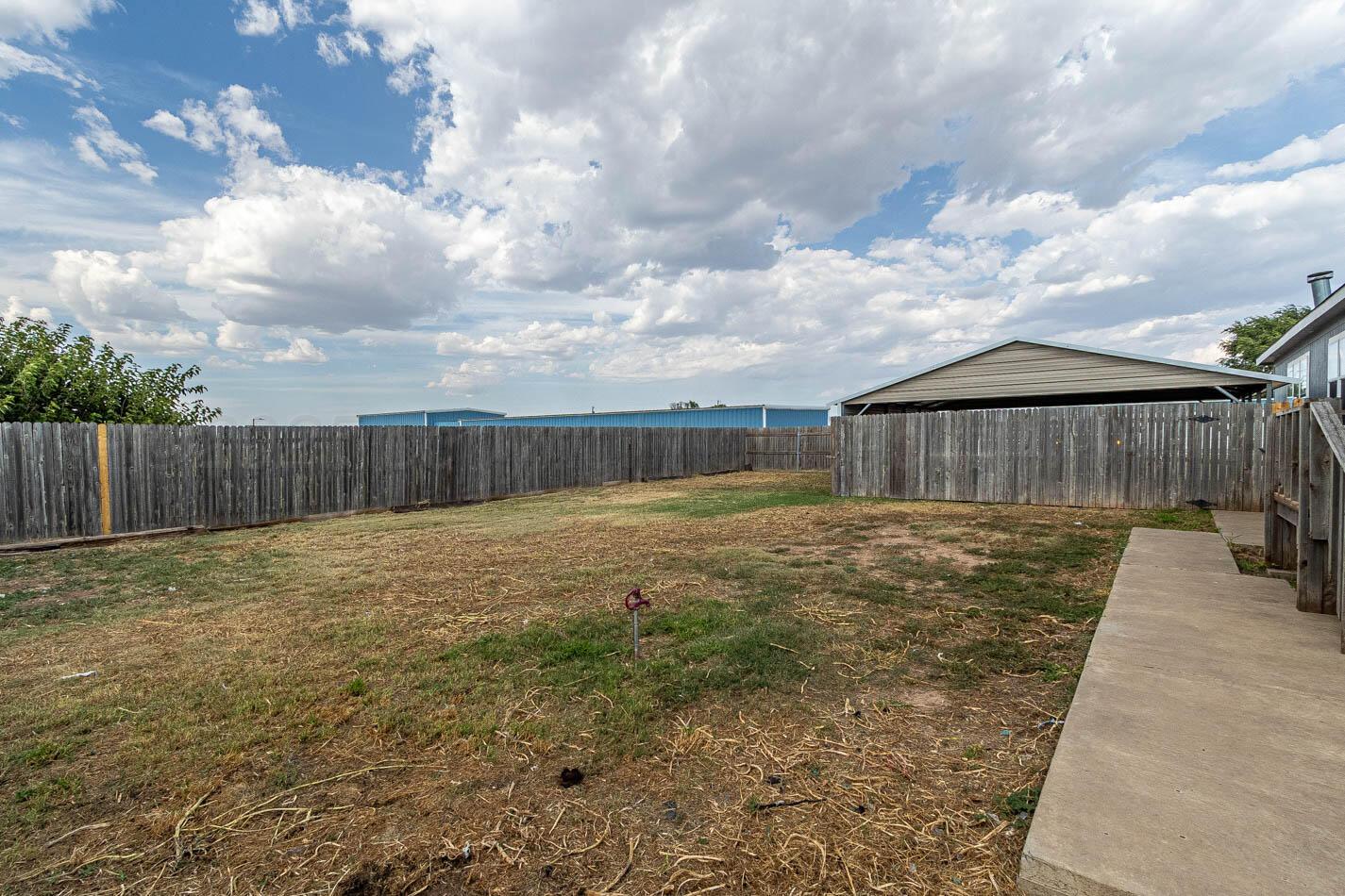 5606 West McCormick Road Amarillo, TX 79118 - Photo 19 of 23 a backyard of a house