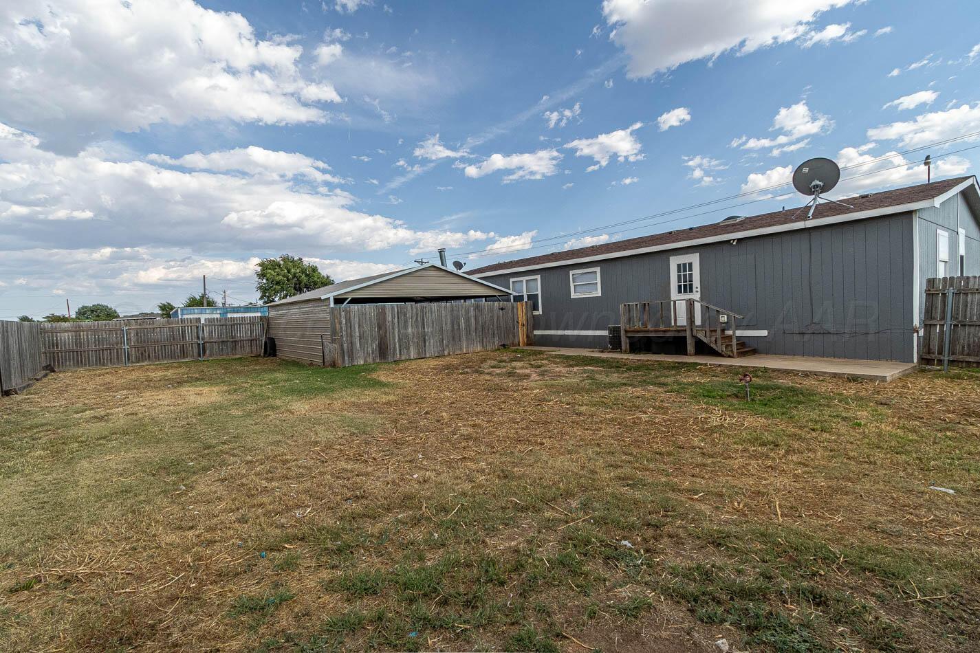 5606 West McCormick Road Amarillo, TX 79118 - Photo 20 of 23 a backyard of a house