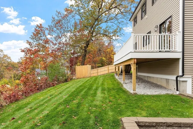 a backyard of a house with lots of green space