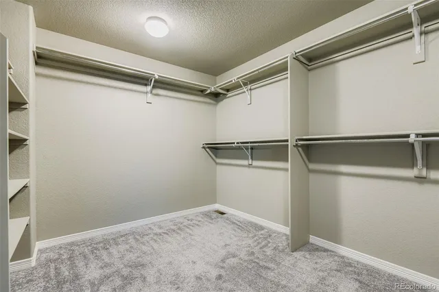 a view of an empty walk in closet