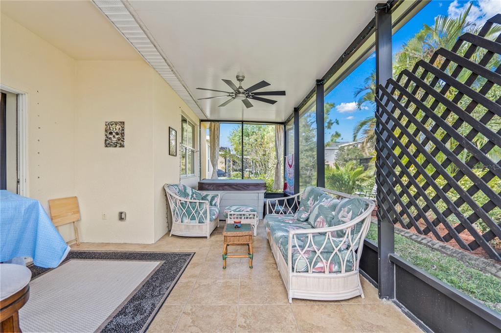 11815 Tempest Harbor Loop Venice, FL 34292 - Photo 28 of 63 a living room with furniture and a large window