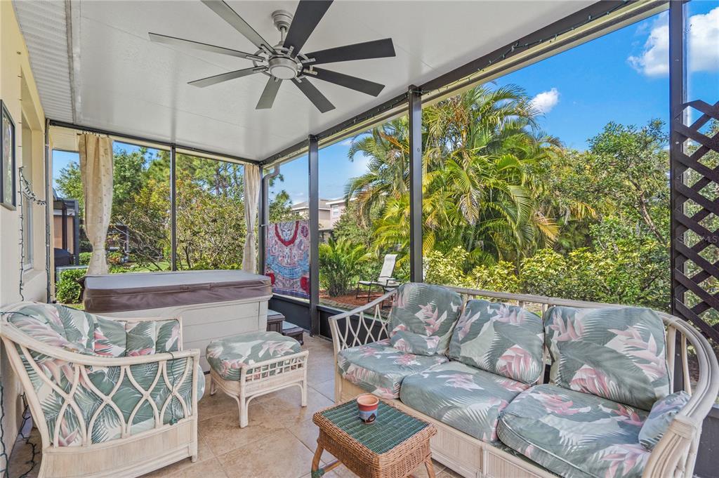 11815 Tempest Harbor Loop Venice, FL 34292 - Photo 31 of 63 a living room with furniture and a large window