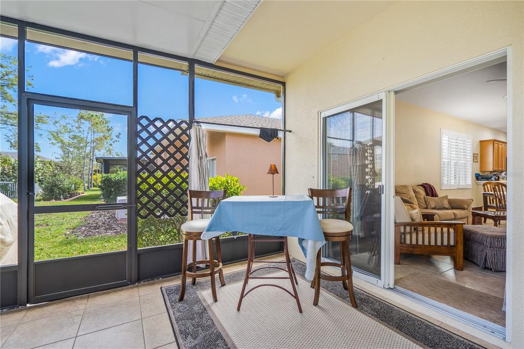 11815 Tempest Harbor Loop Venice, FL 34292 - Photo 33 of 63 a view of a dining room with furniture window and outside view