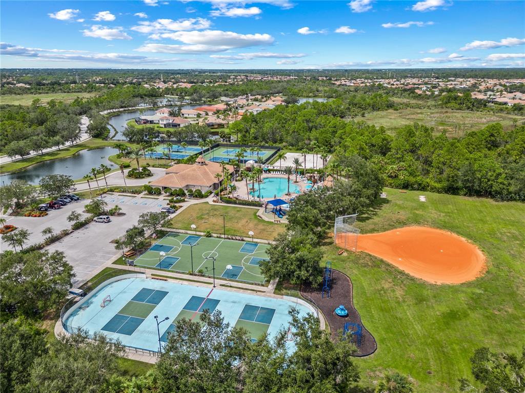 11815 Tempest Harbor Loop Venice, FL 34292 - Photo 41 of 63 an aerial view of residential houses with outdoor space