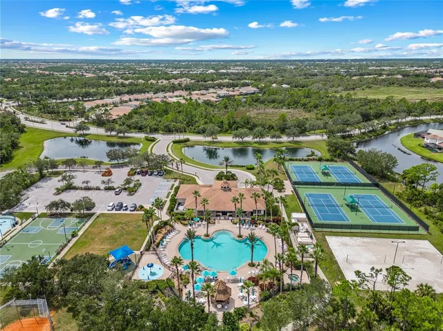 a view of a garden with swimming pool