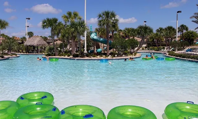 a view of a garden with sitting area