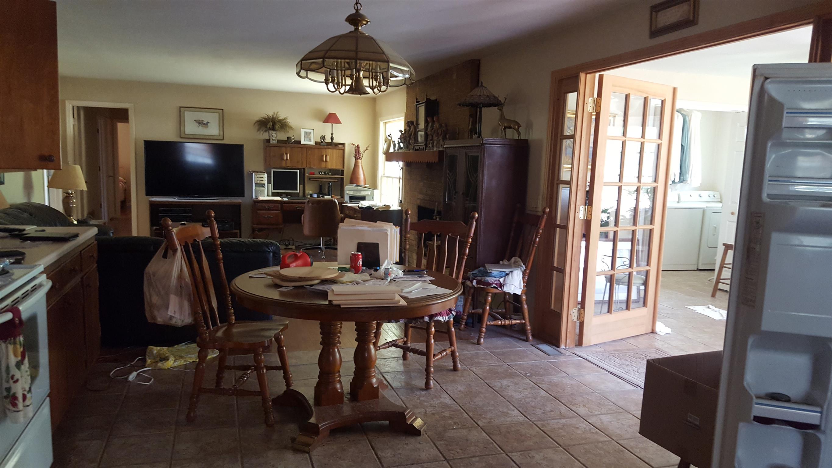 2760 Old Laguardo Road East Lebanon, TN 37087 - Photo 13 of 30 a dining room with furniture a chandelier and window
