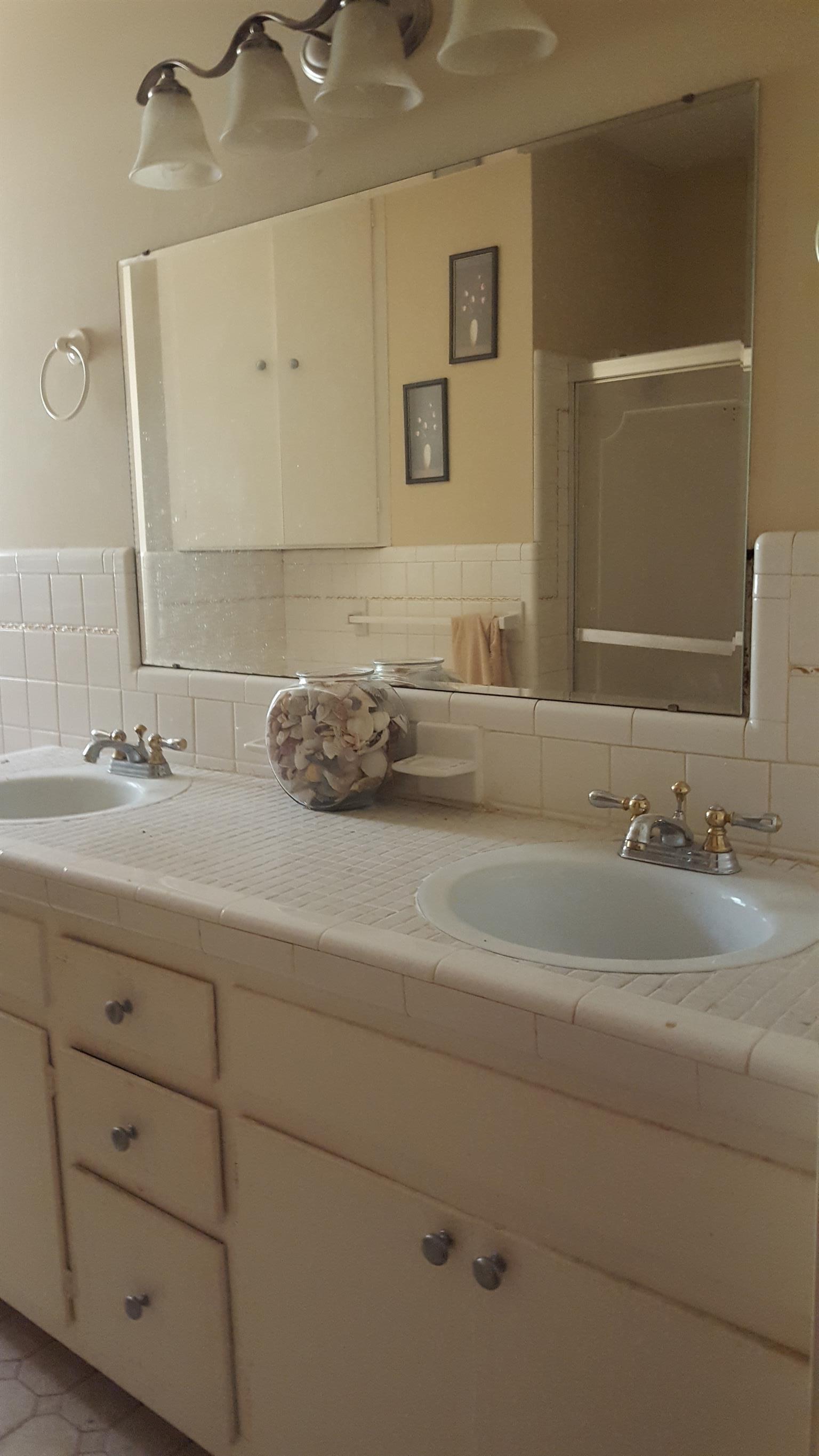 2760 Old Laguardo Road East Lebanon, TN 37087 - Photo 18 of 30 a bathroom with a sink and a mirror