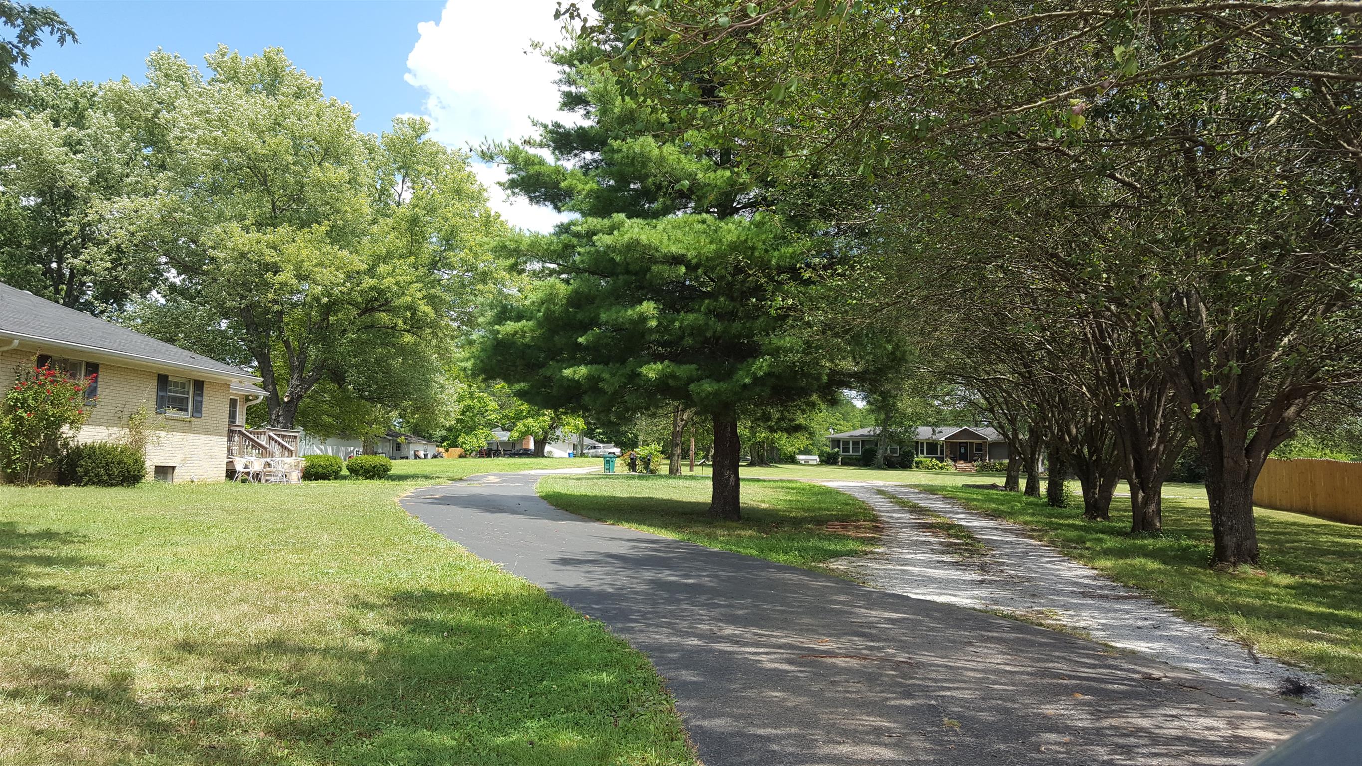 2760 Old Laguardo Road East Lebanon, TN 37087 - Photo 2 of 30 a view of a tree in front of a house