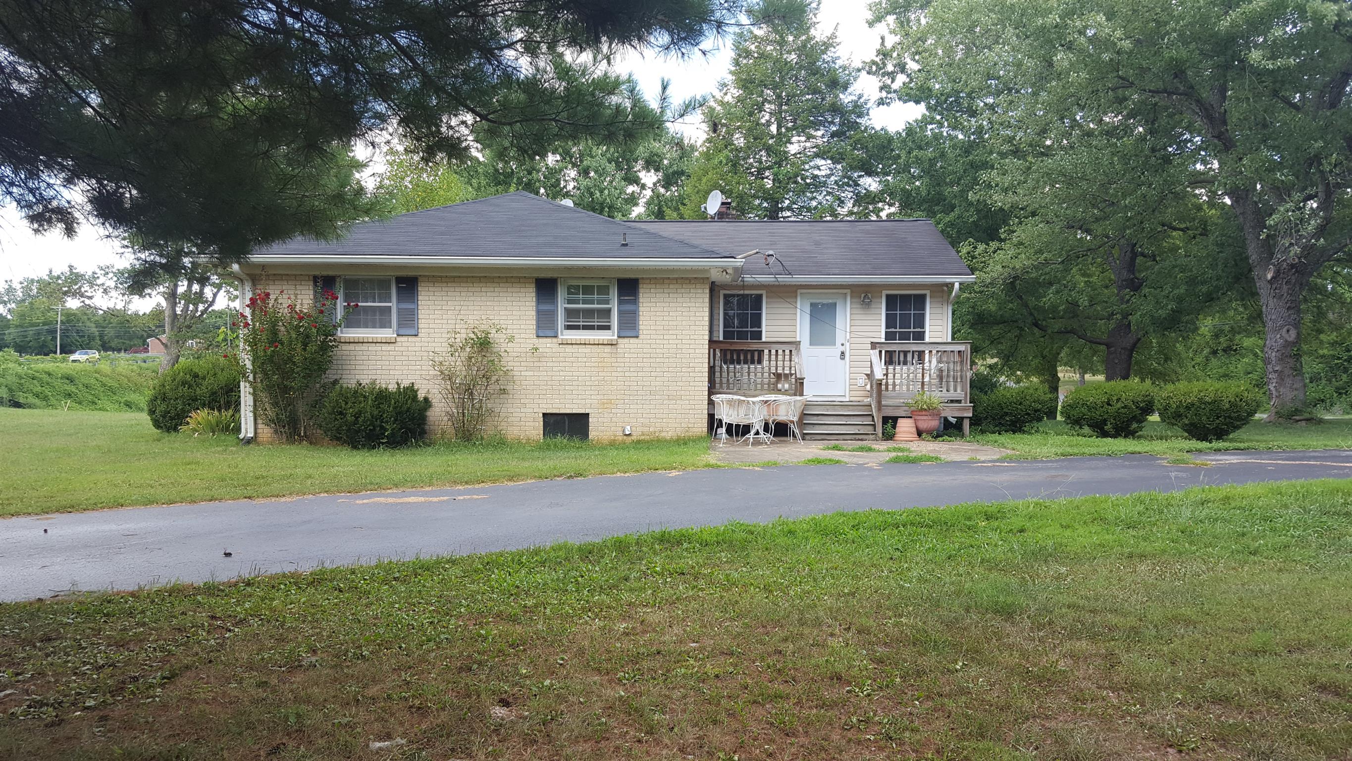 2760 Old Laguardo Road East Lebanon, TN 37087 - Photo 27 of 30 a front view of a house with garden