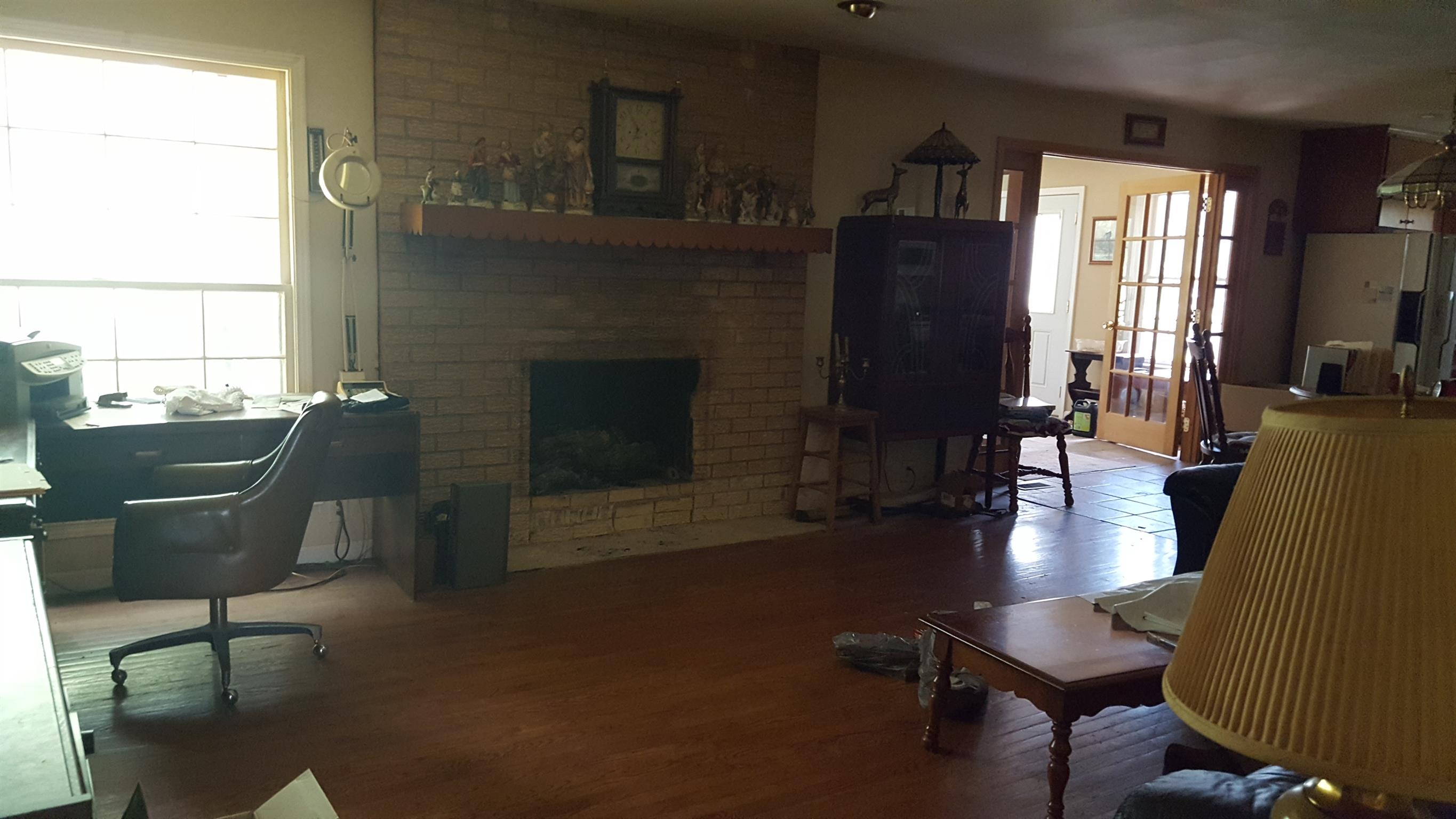 2760 Old Laguardo Road East Lebanon, TN 37087 - Photo 8 of 30 a living room with furniture and a fireplace