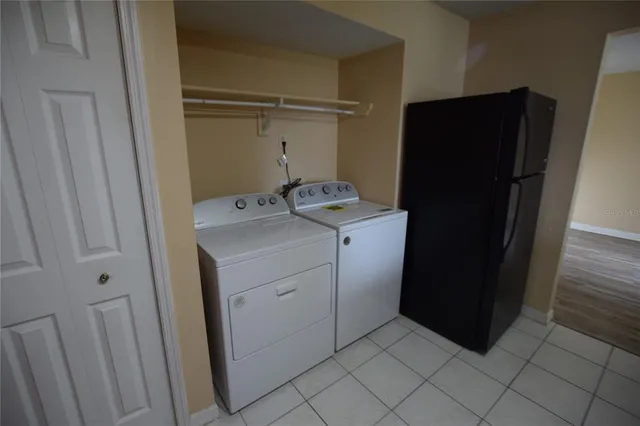 a utility room with cabinets