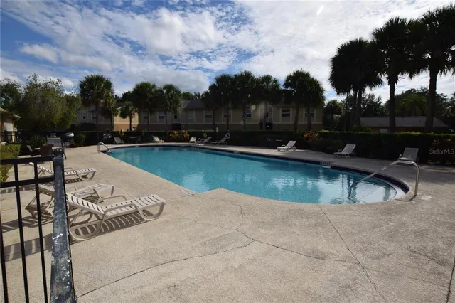 a view of outdoor space yard swimming pool and lake view