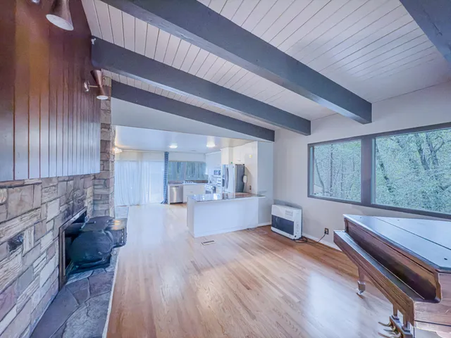 a view of hallway with windows