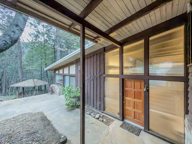 a backyard of a house with lots of green space
