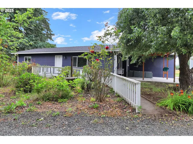 a house view with a garden space