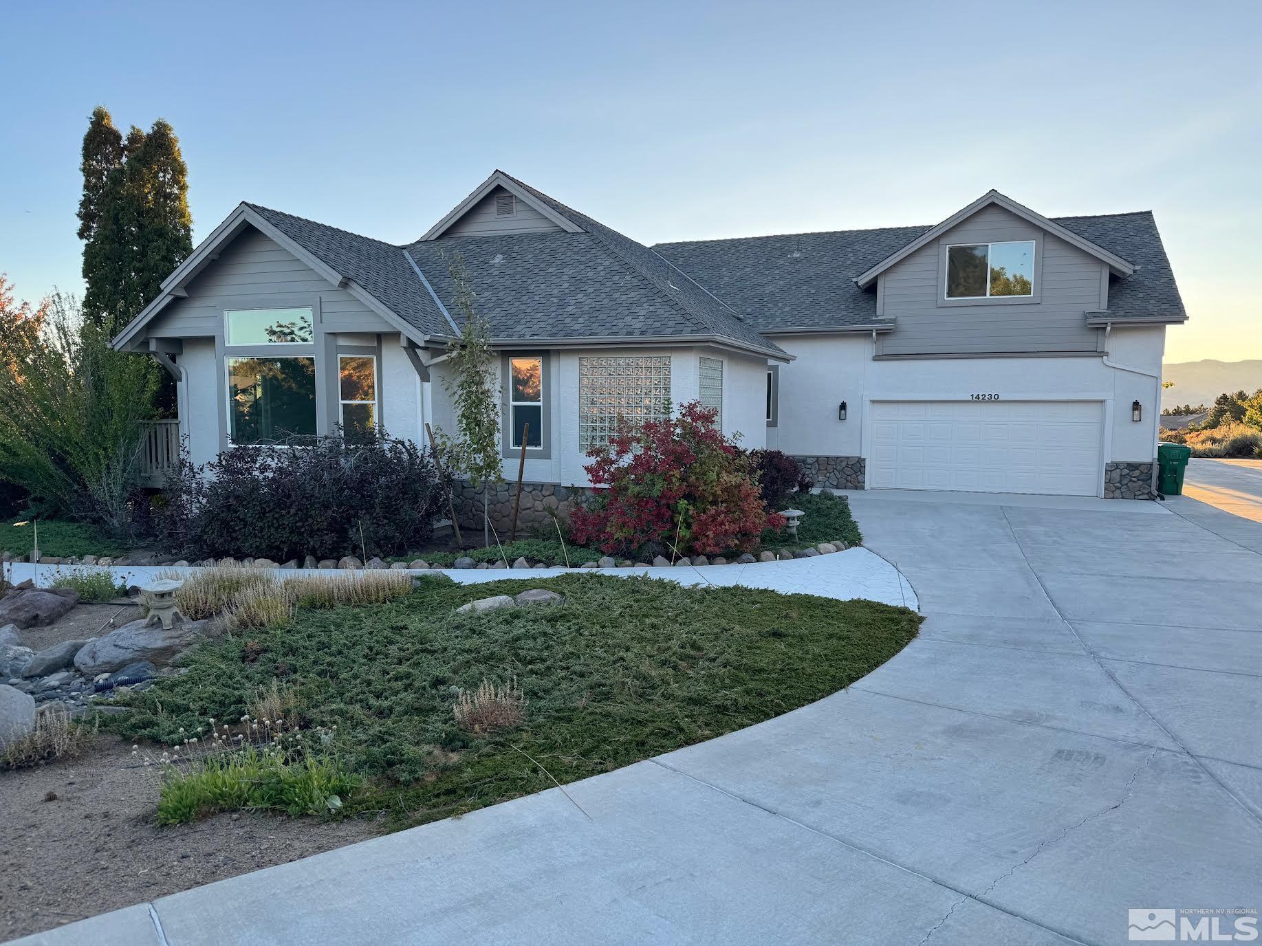 14230 Prairie Flower Court Reno, NV 89511 - Photo 1 of 39 a front view of house with yard and green space