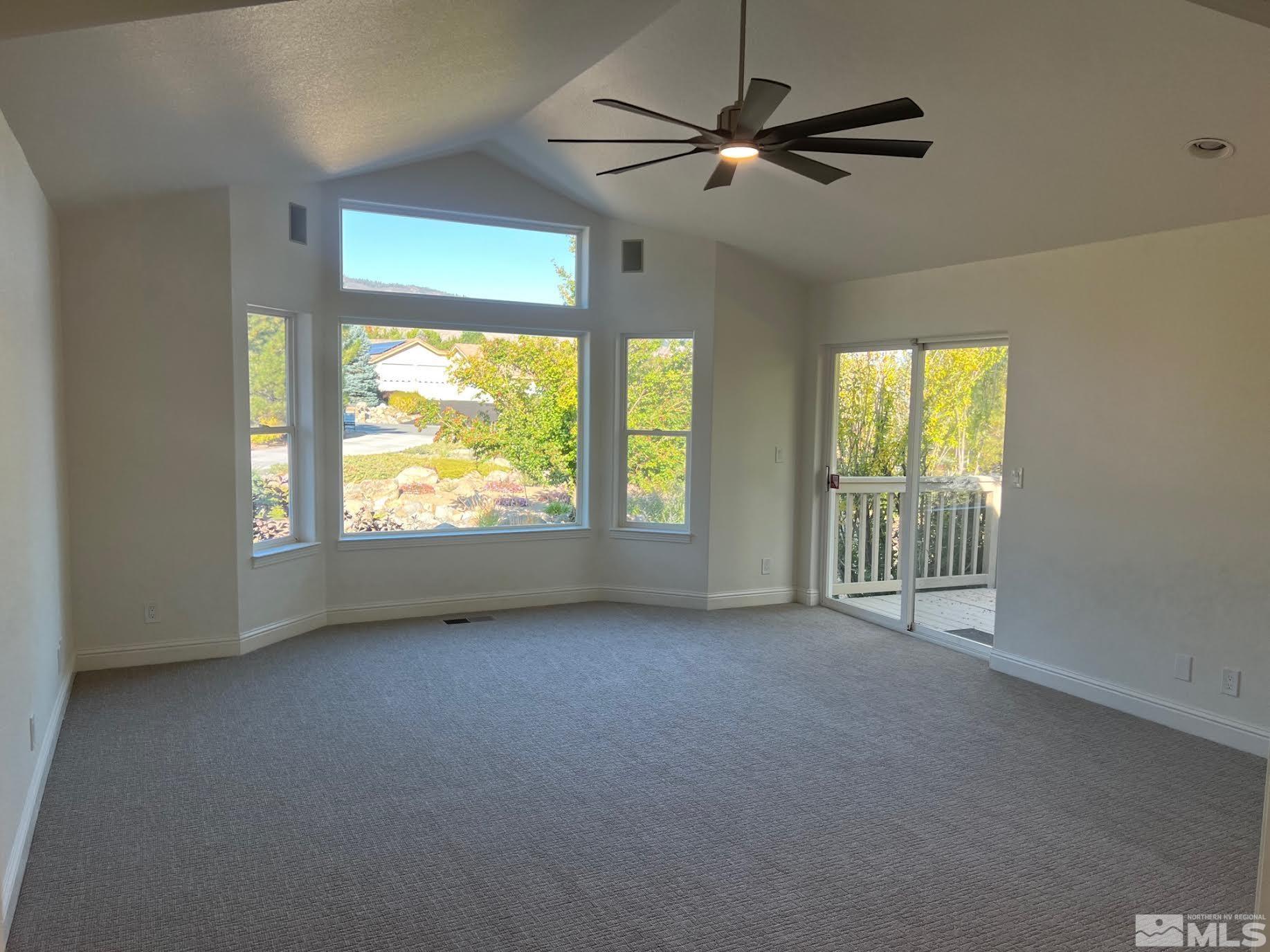 14230 Prairie Flower Court Reno, NV 89511 - Photo 13 of 39 a view of an empty room with a window