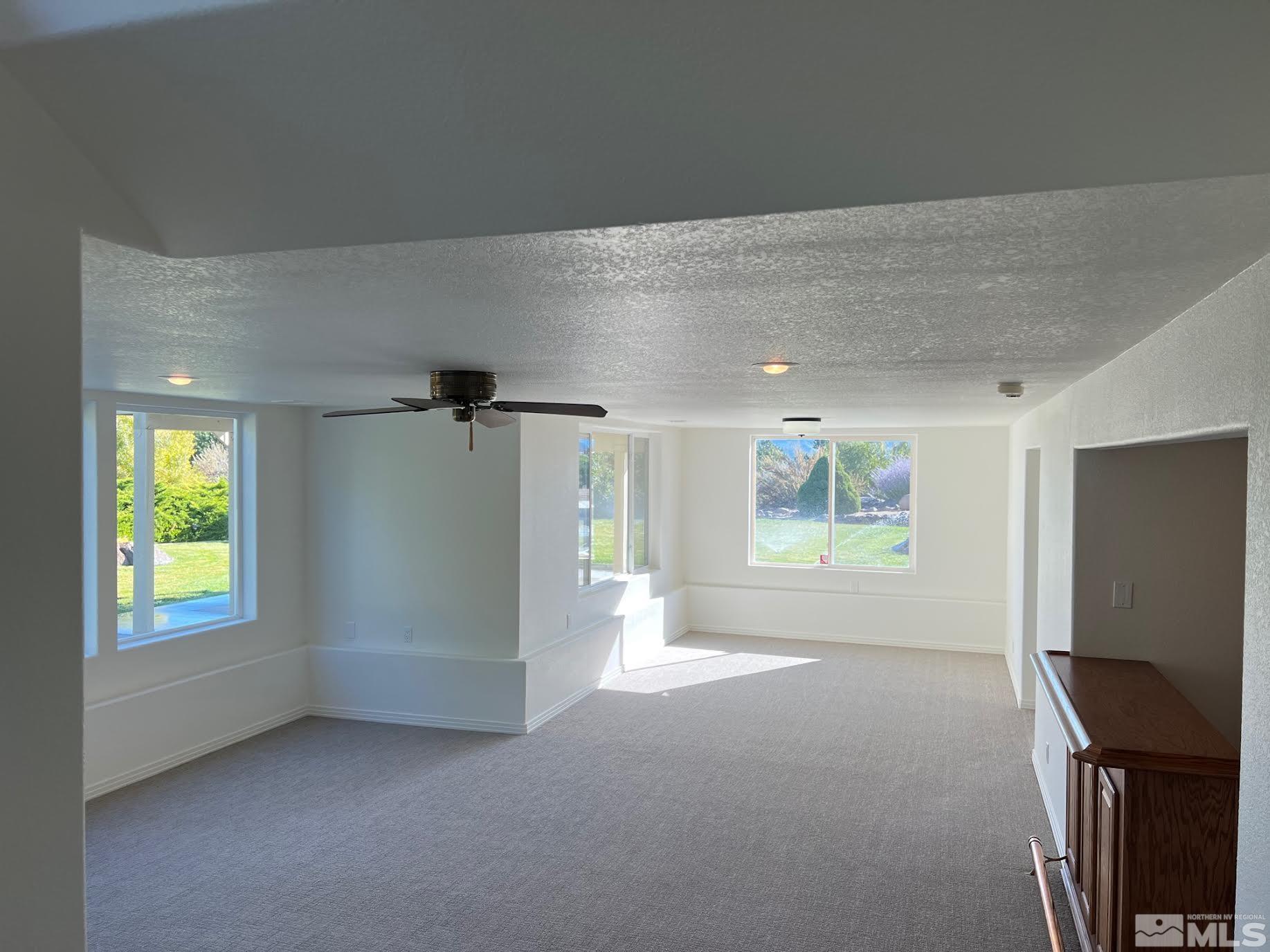 14230 Prairie Flower Court Reno, NV 89511 - Photo 28 of 39 a view of an empty room with a window