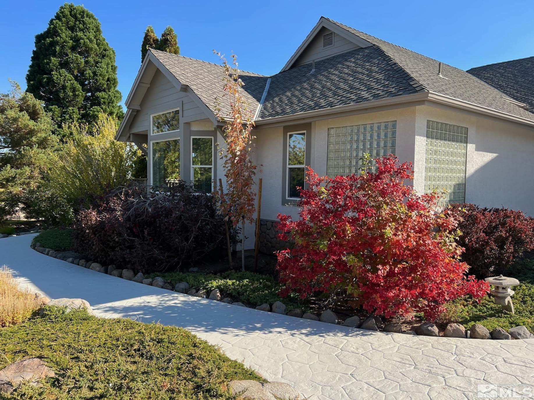 14230 Prairie Flower Court Reno, NV 89511 - Photo 3 of 39 front view of a house with a yard