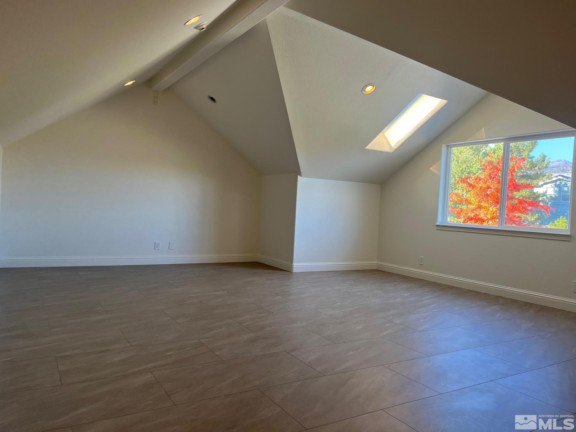 14230 Prairie Flower Court Reno, NV 89511 - Photo 31 of 39 an empty room with windows