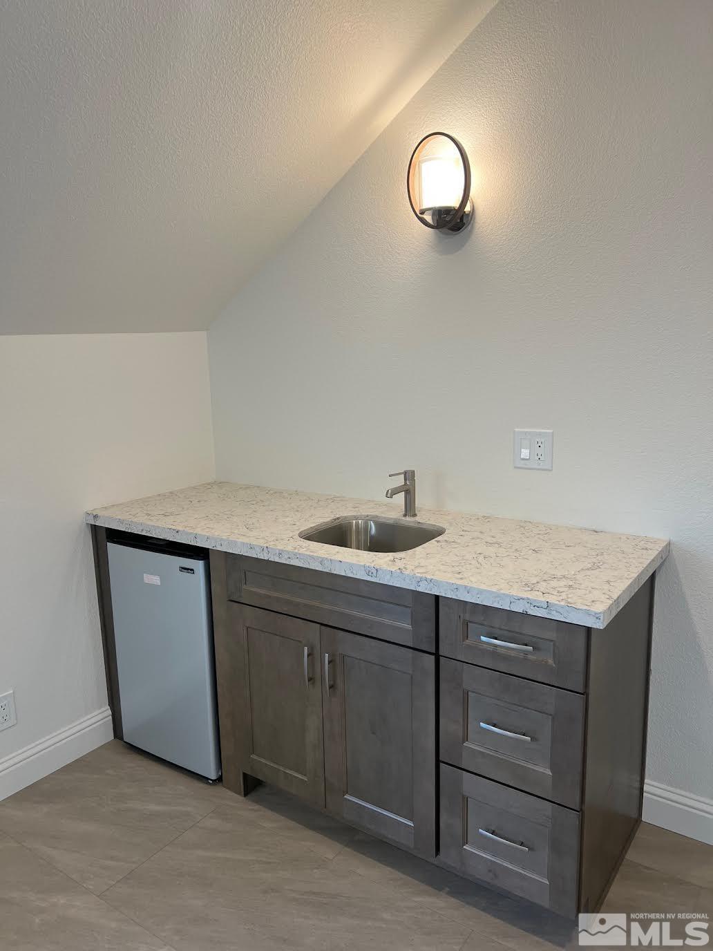 14230 Prairie Flower Court Reno, NV 89511 - Photo 33 of 39 a bathroom with a sink and a mirror