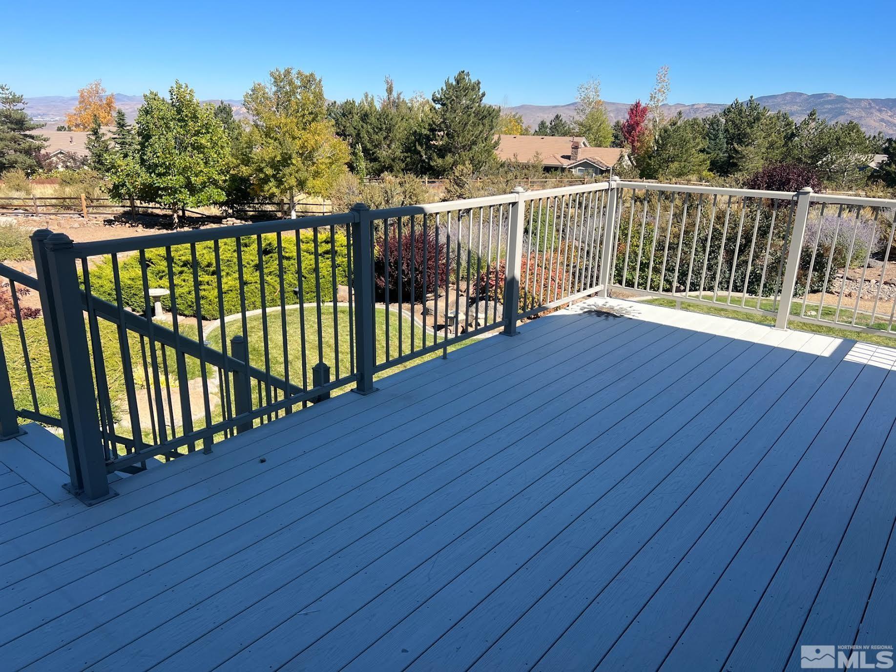 14230 Prairie Flower Court Reno, NV 89511 - Photo 34 of 39 a view of balcony with wooden floor and fence