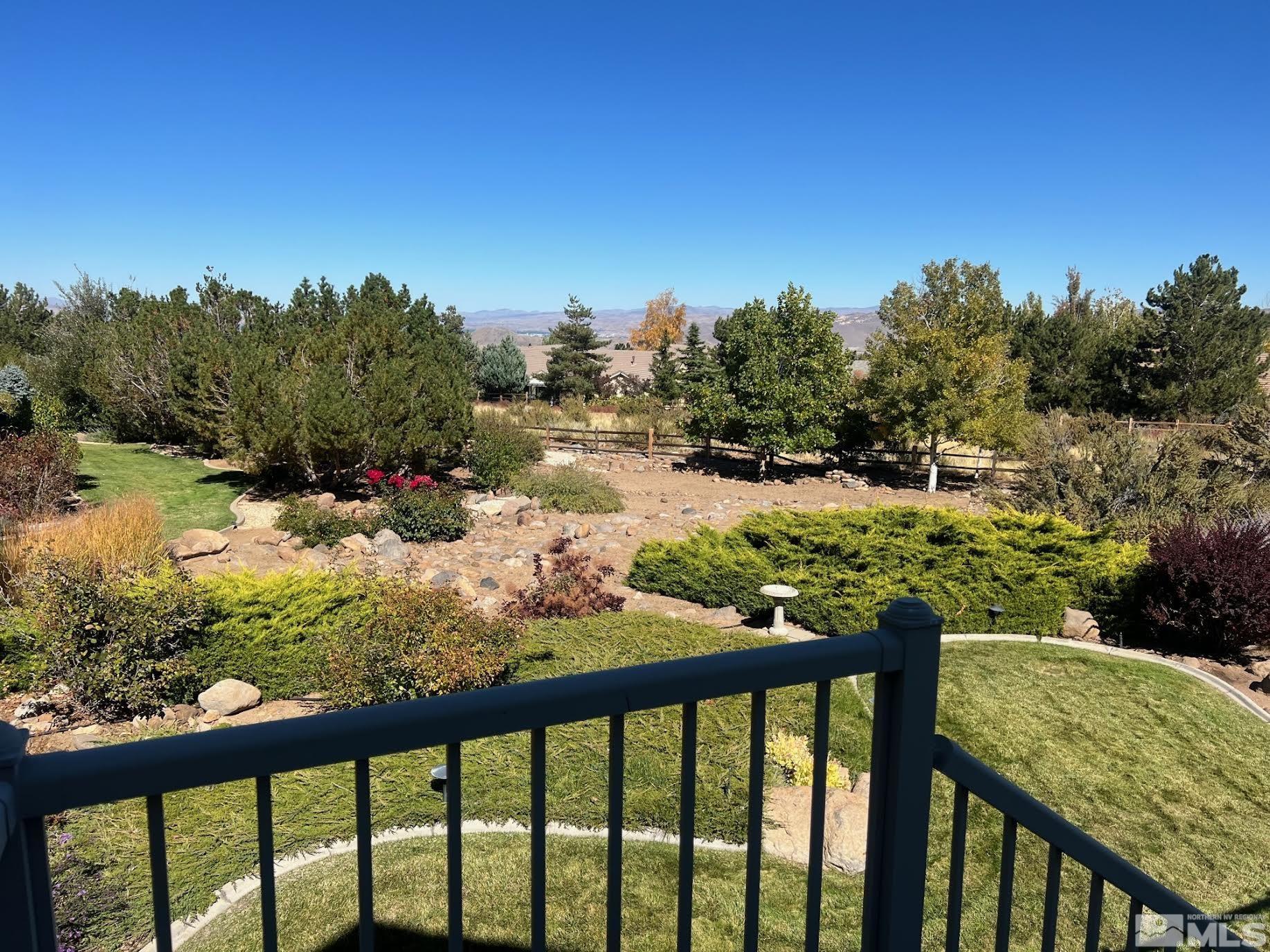 14230 Prairie Flower Court Reno, NV 89511 - Photo 35 of 39 a view of a porch and a yard