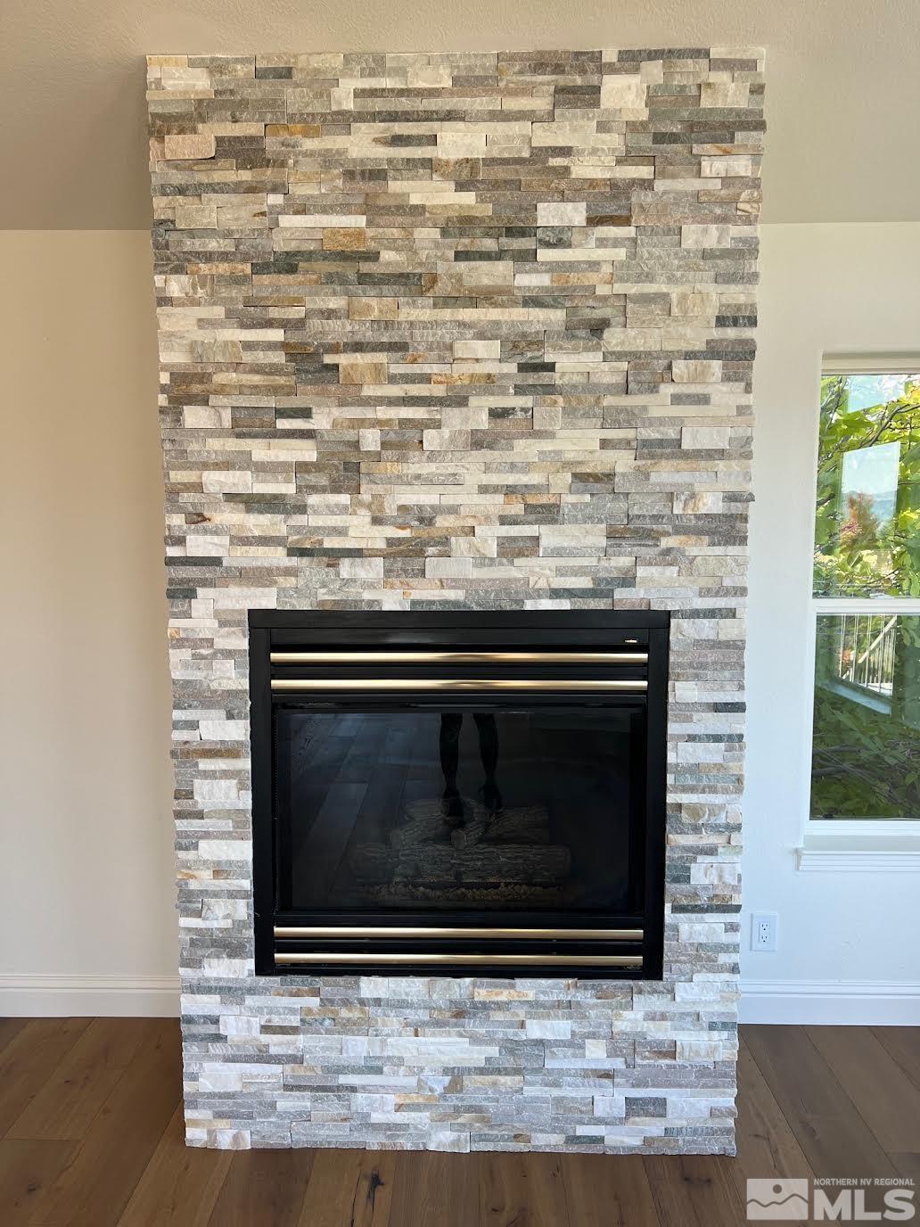 14230 Prairie Flower Court Reno, NV 89511 - Photo 7 of 39 a stove top oven sitting inside of a kitchen