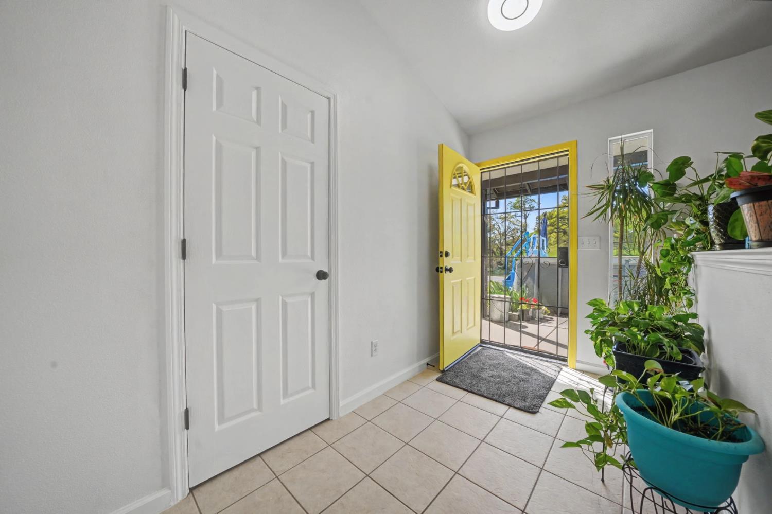 7761 Jenny Lind Road Valley Springs, CA 95252 - Photo 3 of 35 a entryway with furniture and a potted plant