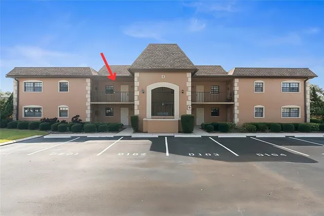 a front view of a house with a garage