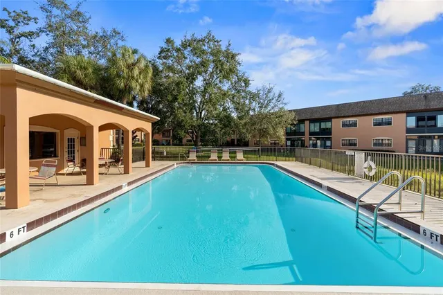 a view of a house with swimming pool