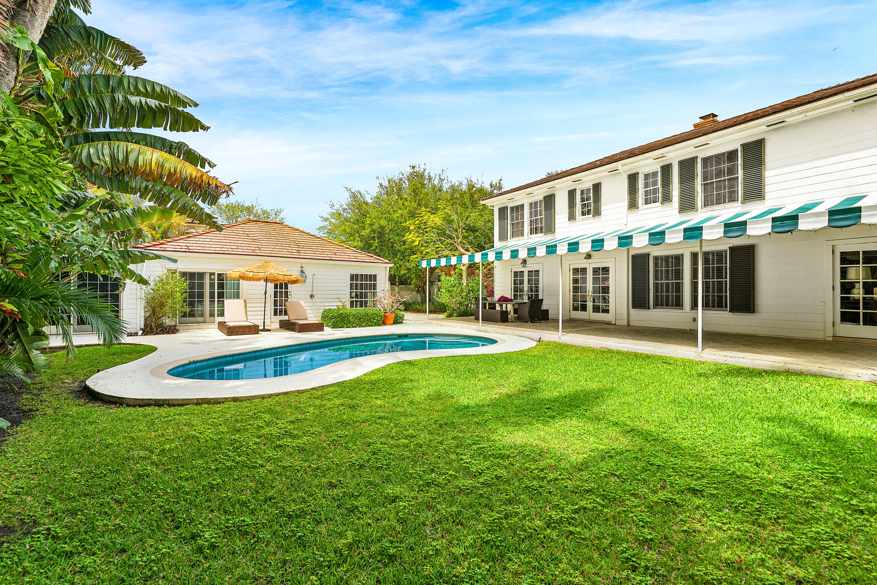 210 Merrain Road Palm Beach, FL 33480 - Photo 3 of 33 Back yard and pool