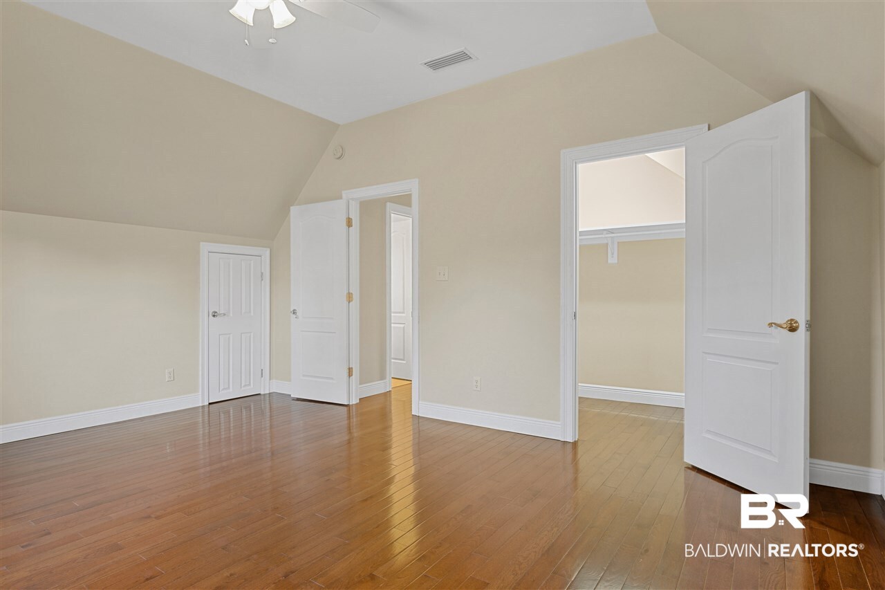 7785 Cuss Fork Road Wilmer, AL 36587 - Photo 24 of 38 Bedroom 2 large walk in closet, additional storage