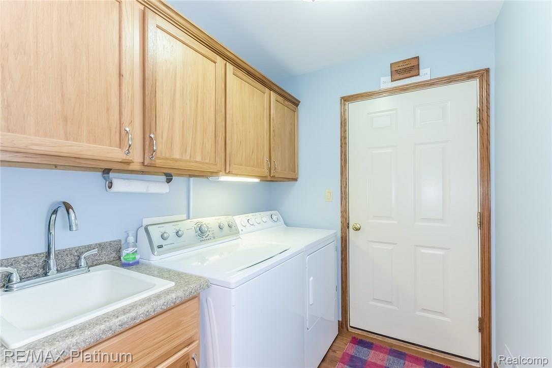 4558 North Latson Road Howell, MI 48855 - Photo 21 of 46 Main Floor Laundry makes an easier wash day (near rear entry)