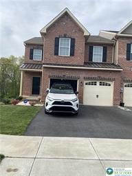 4309 Beech Drive Nazareth, PA 18064 - Photo 1 of 1 This appealing townhome showcases a distinguished brick facade and a functional attached garage.