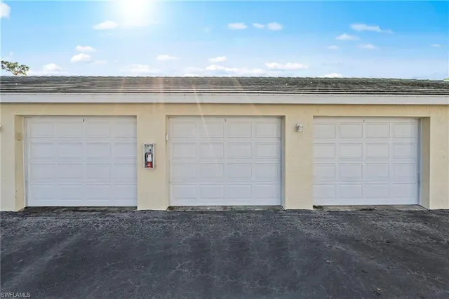 an empty room with a sink