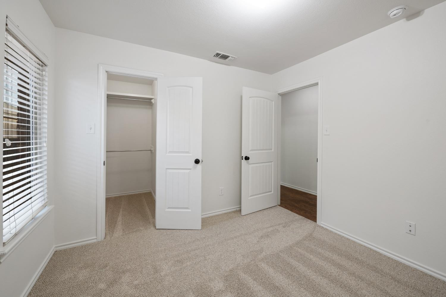 6816 Oakridge Avenue Lubbock, TX 79424 - Photo 14 of 19 an empty room with a bathroom