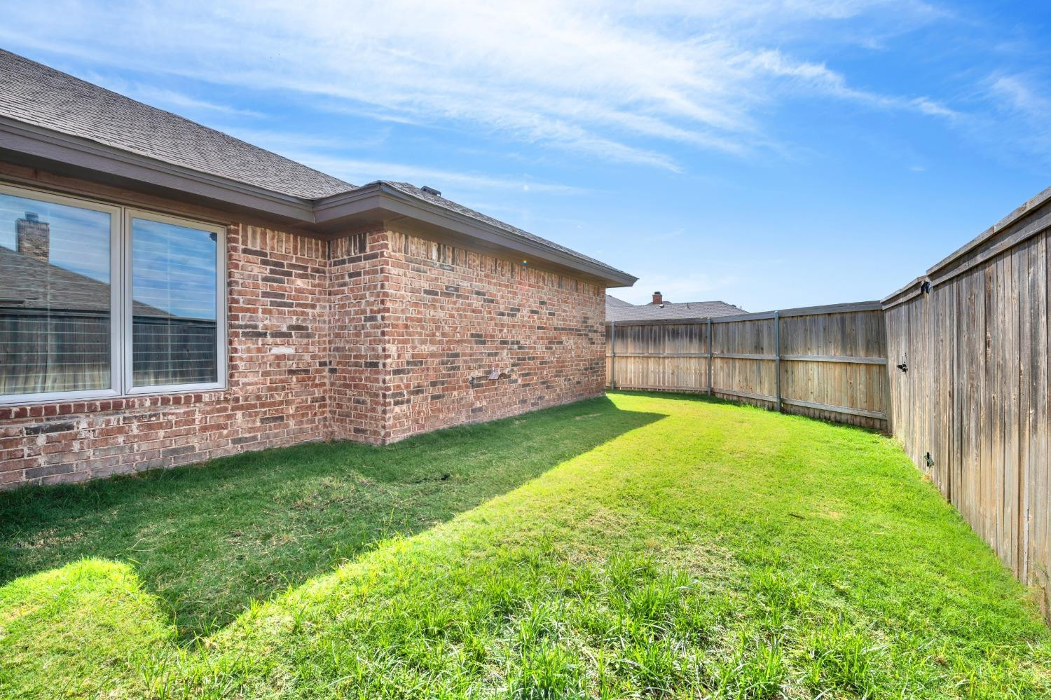 6816 Oakridge Avenue Lubbock, TX 79424 - Photo 18 of 19 a view of backyard with garden