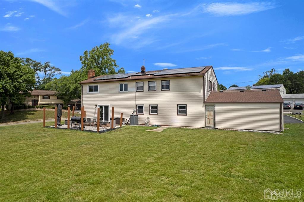 23 Vauxhall Road East Brunswick, NJ 08816 - Photo 11 of 28 a view of a house with patio
