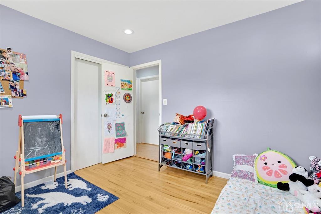 23 Vauxhall Road East Brunswick, NJ 08816 - Photo 15 of 28 a bedroom with toys and a couch
