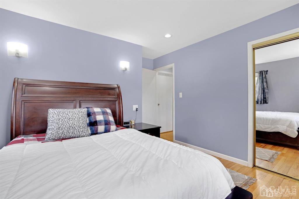 23 Vauxhall Road East Brunswick, NJ 08816 - Photo 26 of 28 a bedroom with a bed and a window